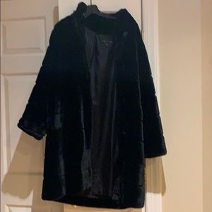 Long faux mink coat.